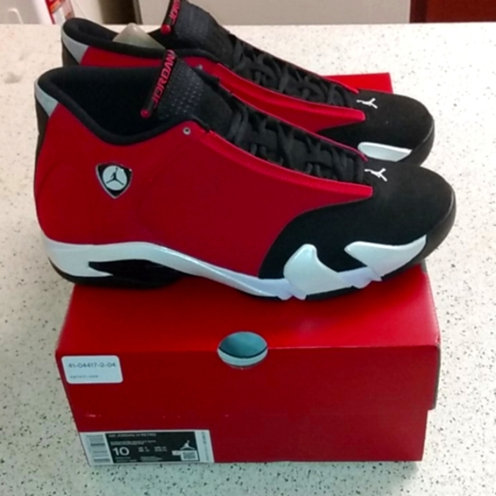 - Air Jordan 14 “TORO”